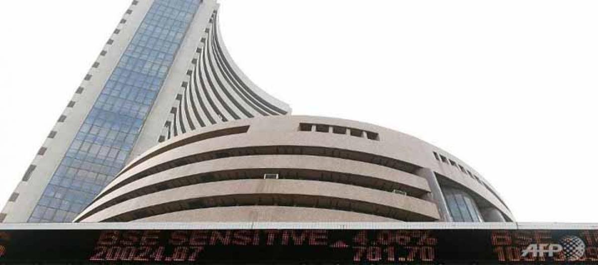 Key Indian equity indices trade flat early on Tuesday
