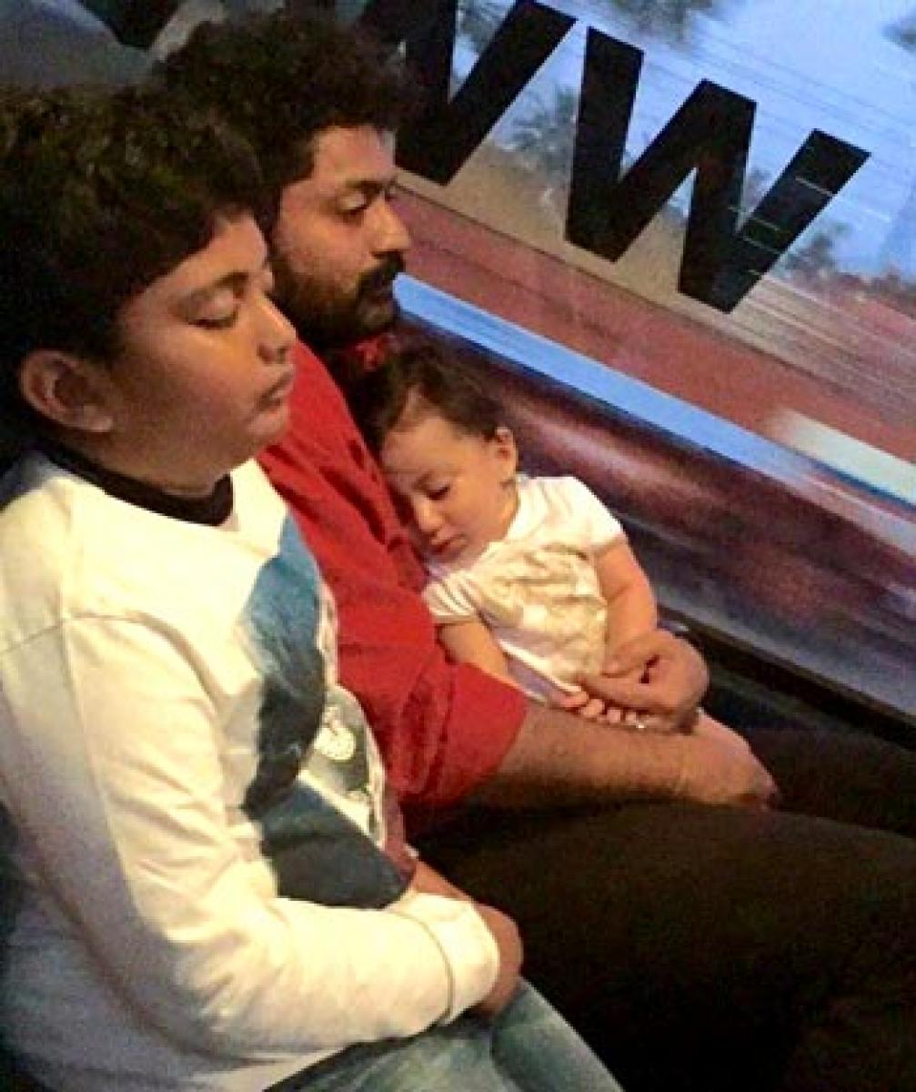 Nara Devansh caught napping on Kalyan Rams lap