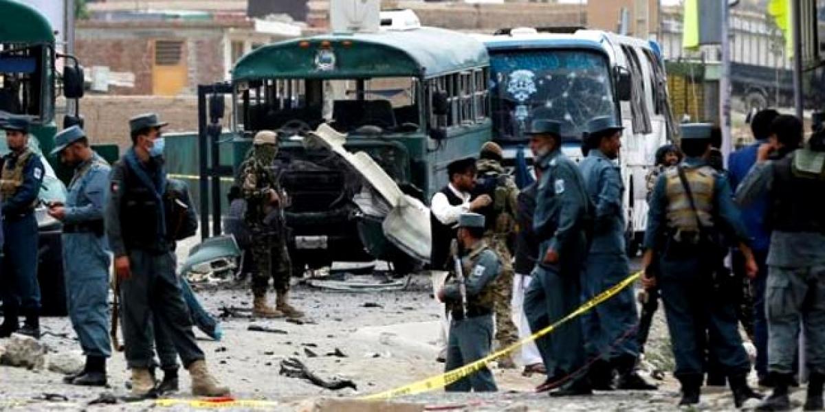 30 killed as Taliban suicide bombers hit police buses in Kabul