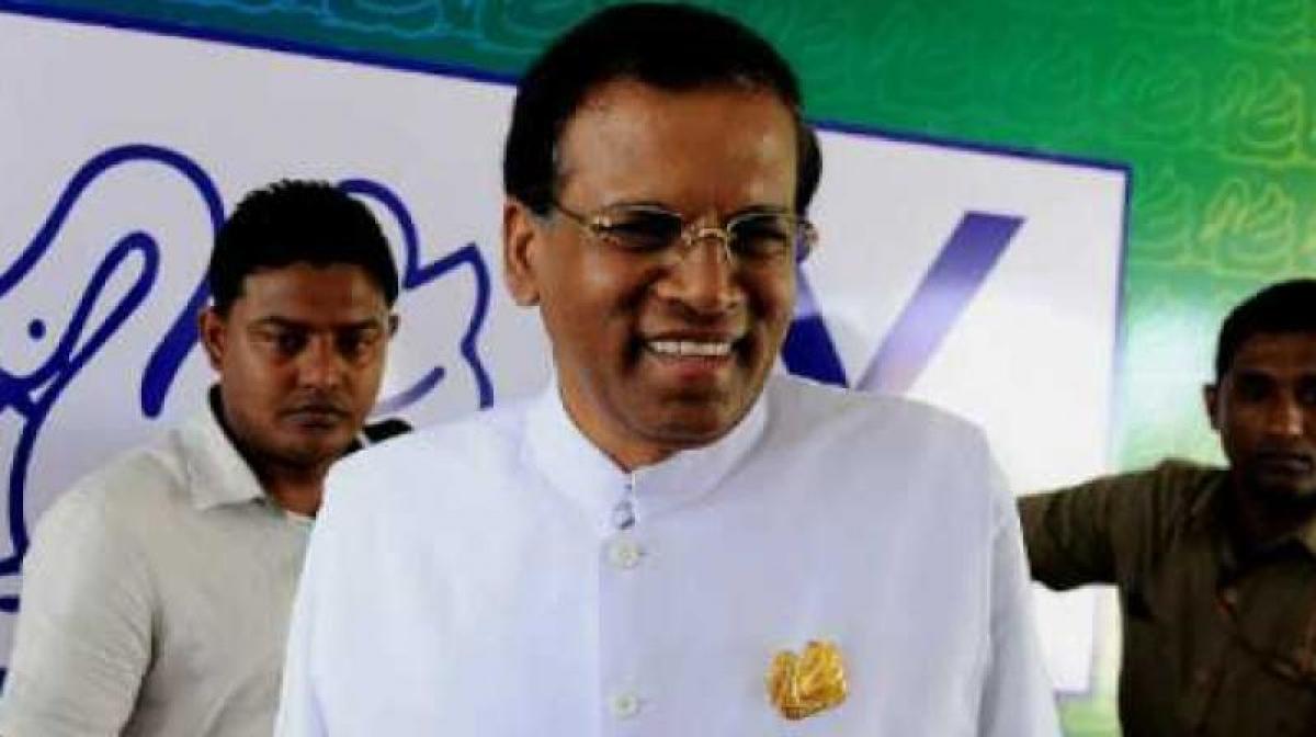 Sri Lankan President defends returning land to Tamilians