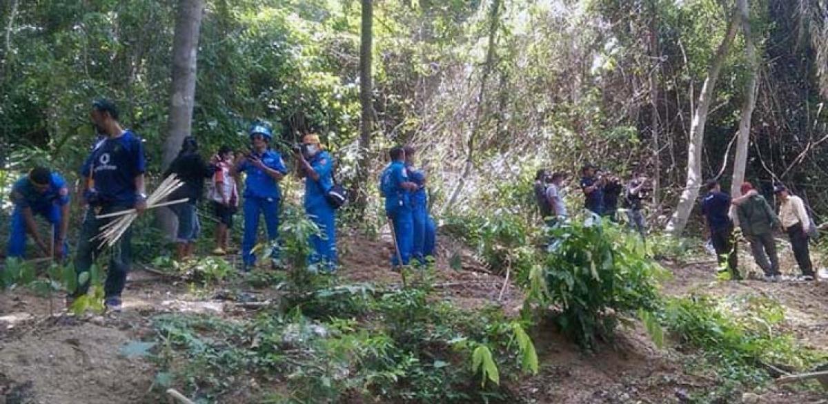 Malaysia Finds Mass Graves of 24 Suspected Human Trafficking Victims