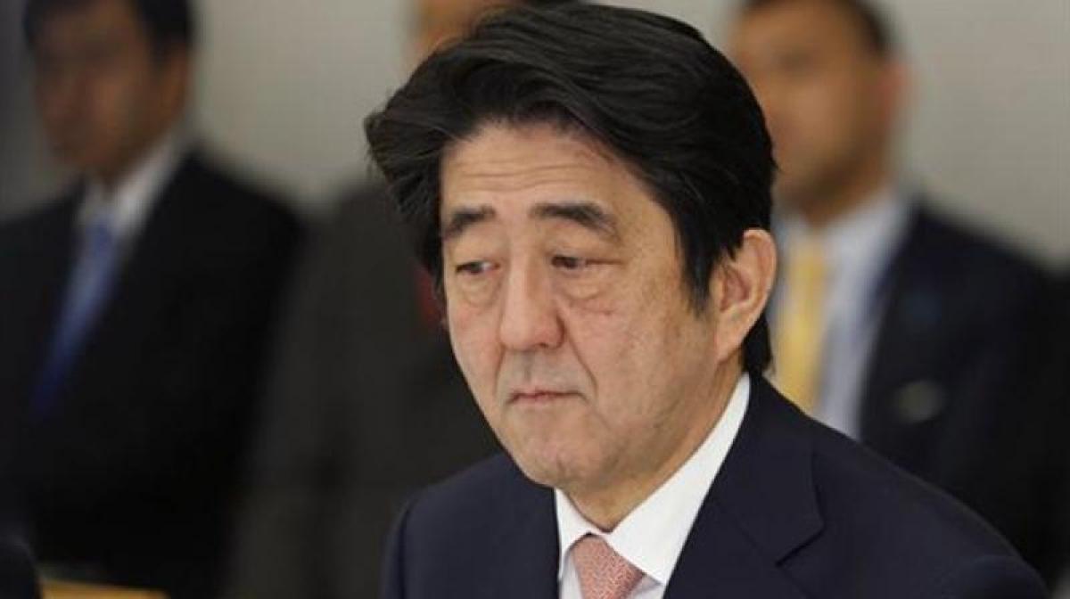 Shinzo Abe visits Putin looking to warm ties despite island dispute