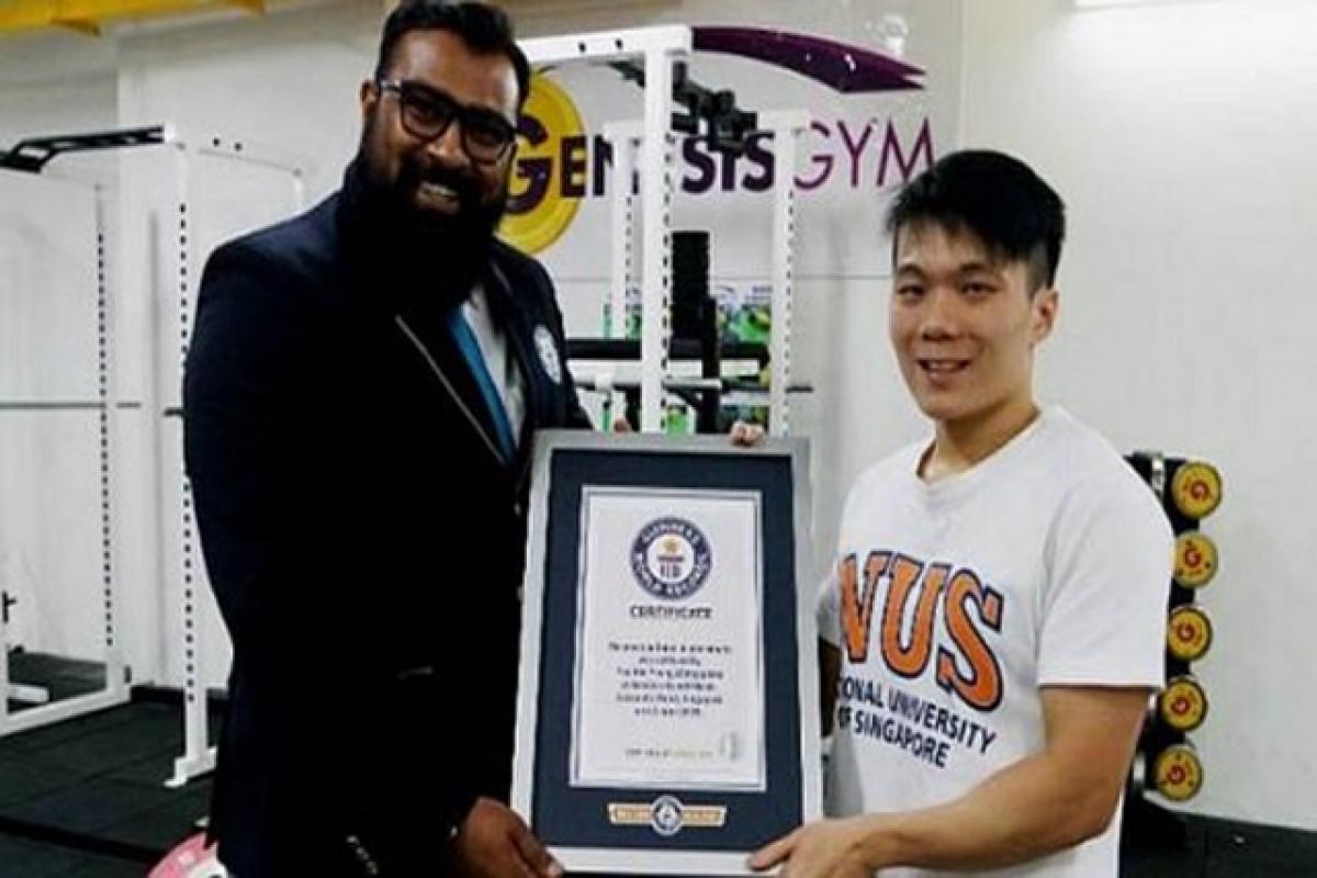 Singapore teen obsessed with pull-ups breaks world record