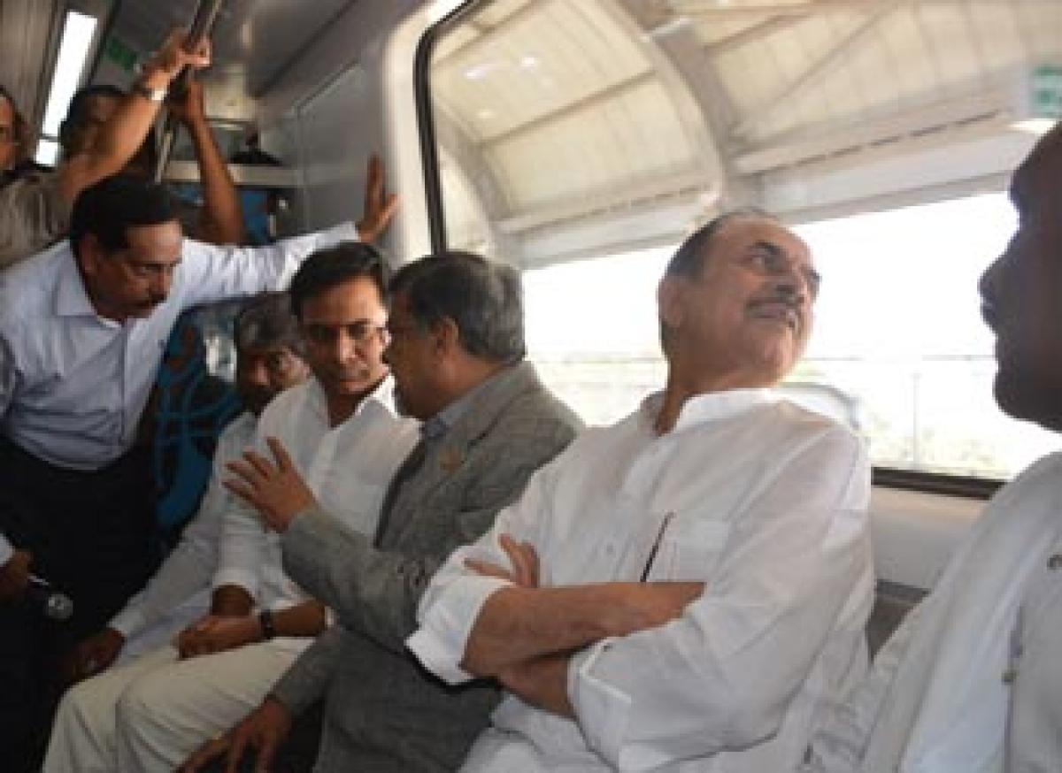 Ministers travel by Metro Rail