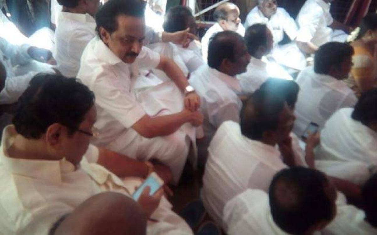 DMK MLAs facing one week suspension, protest outside TN Assembly