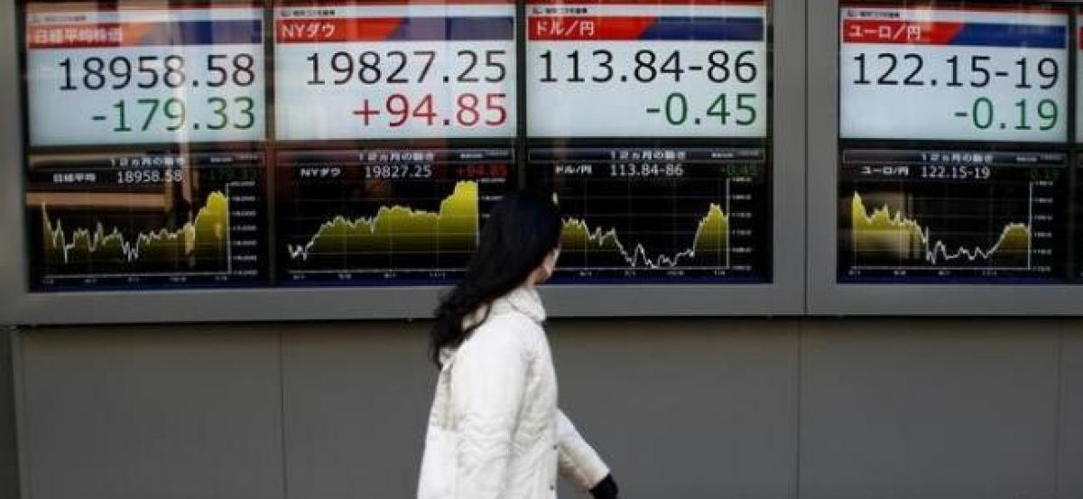 Asian stocks climb, oil down amid U.S. supply glut concerns