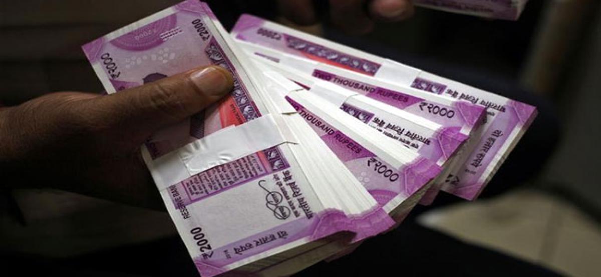 Rupees slide from outflows, demonetization likely near end