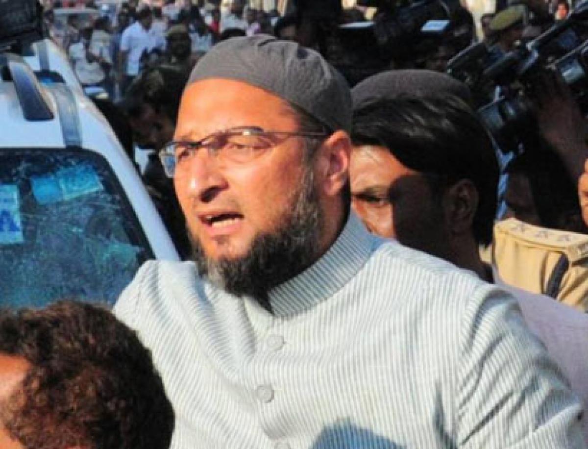 Owaisi surrenders before police