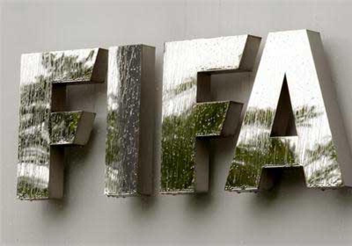 Football officials arrest during raid deepens FIFA crisis