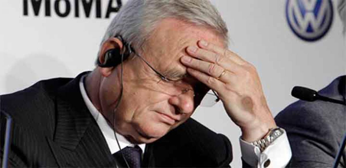 VW CEO quits as probe launched