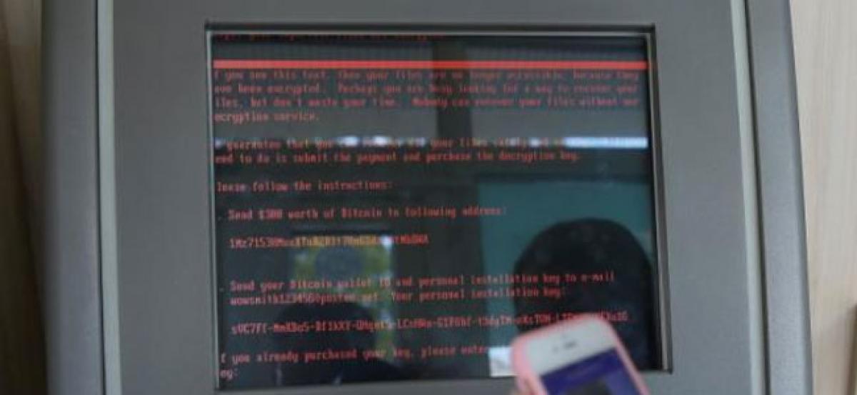 Cyber attack sweeps globe, researchers see WannaCry link