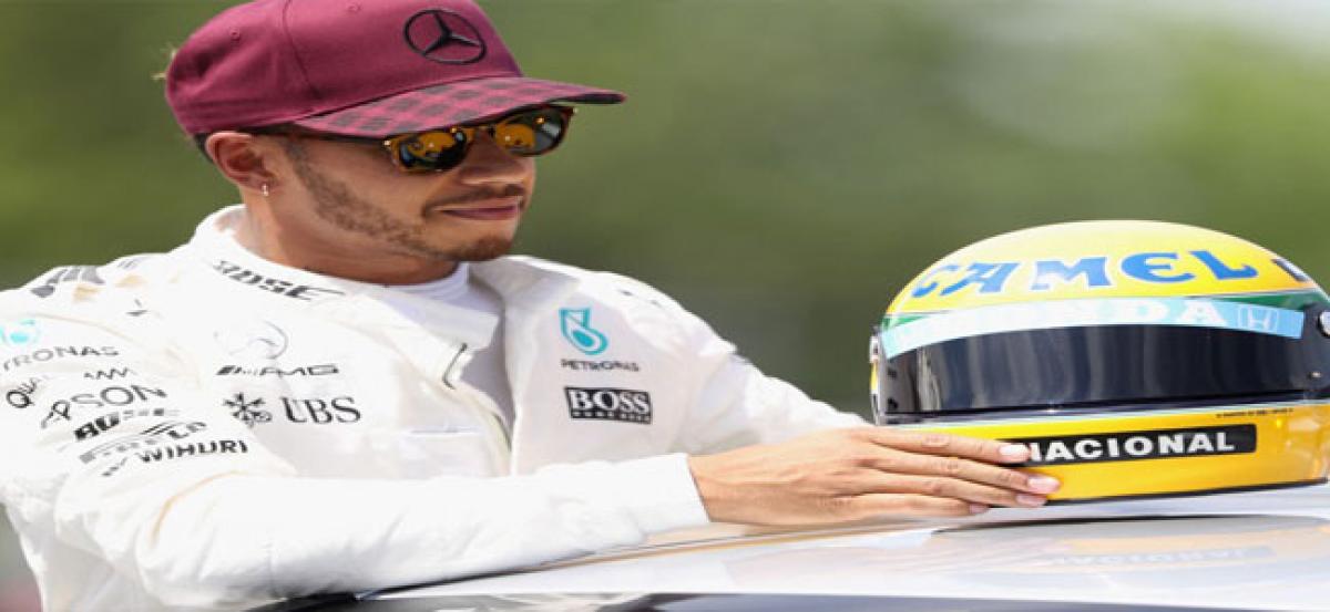 Lewis Hamilton gifted Senna’s helmet