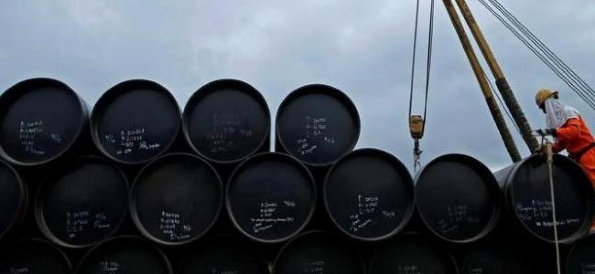 Oil prices fall on U.S. inventory build; Libya output ramps up