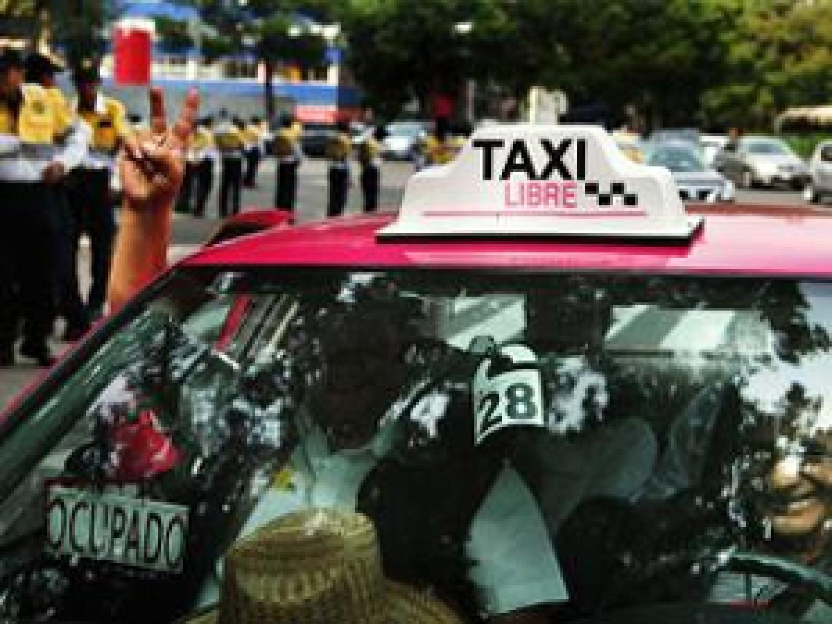 Mexico taxi drivers step up pressure against Uber