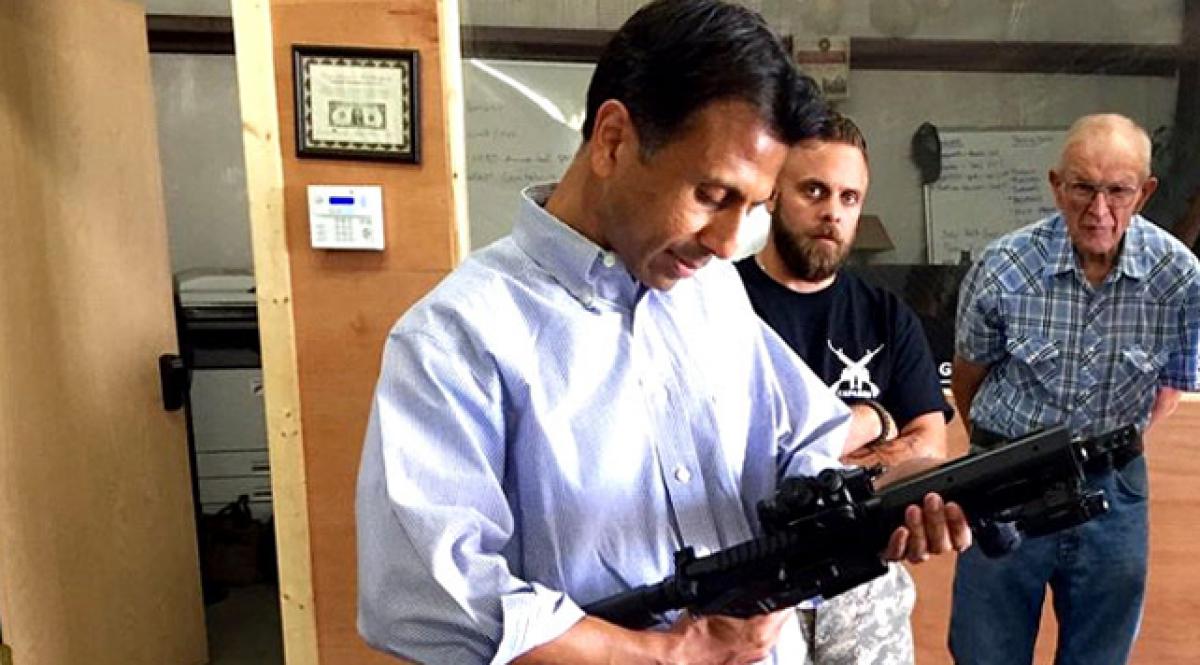 Jindal mocked for posing with gun at campaign stop