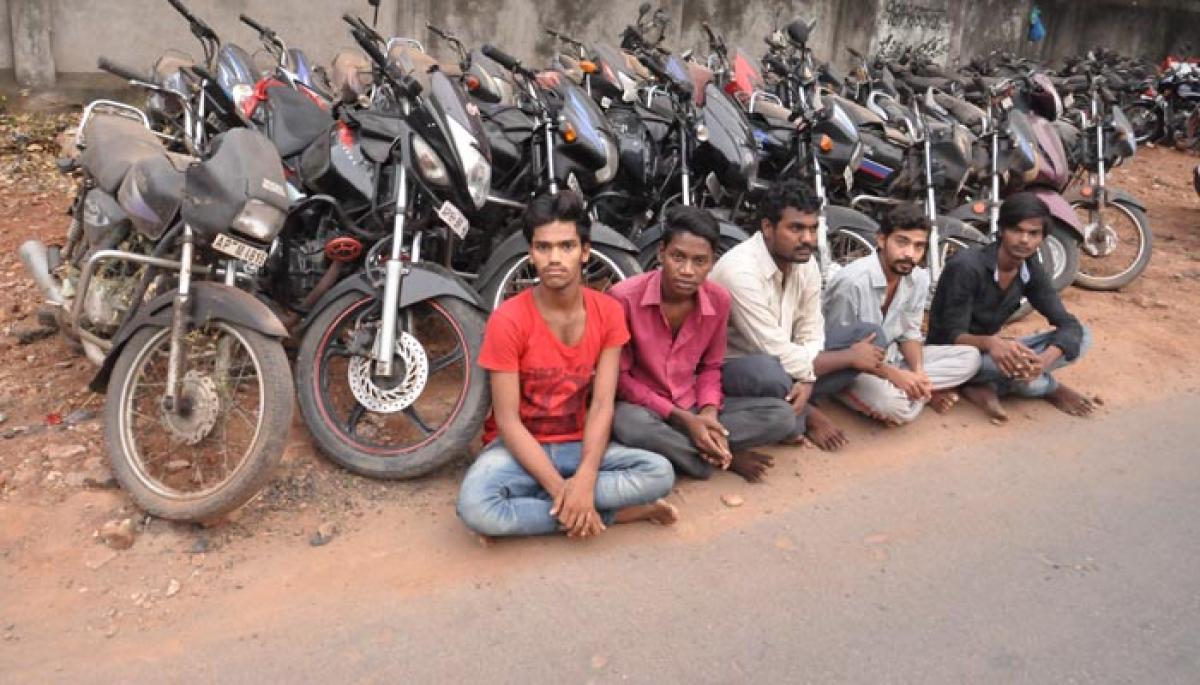 Five held, vehicles seized
