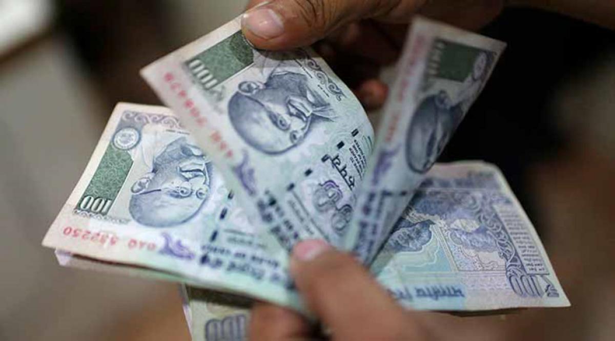 Rupee up 12 paise at Rs 67.19 against dollar in late morning trade