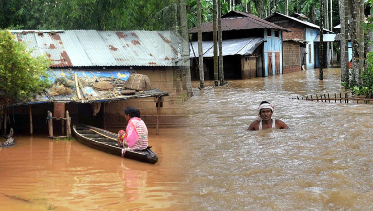 Assam flood toll hits 13, CM undertakes aerial visit