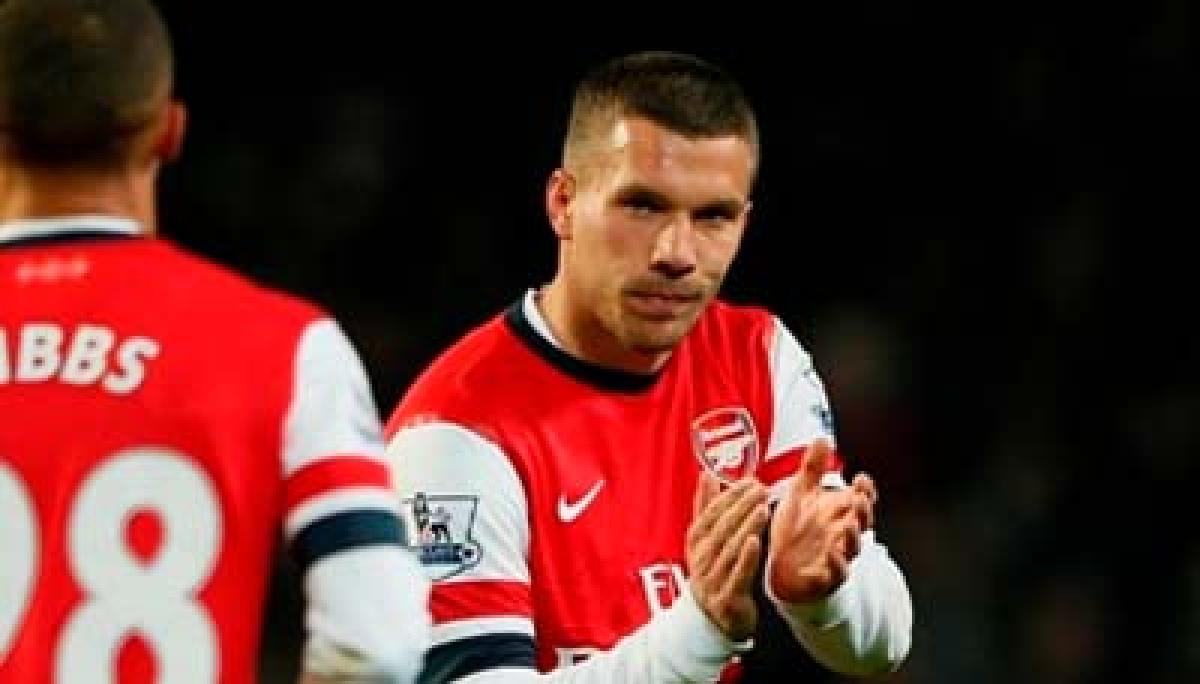 Arsenal striker Podolski inks three-year deal with Galatasaray