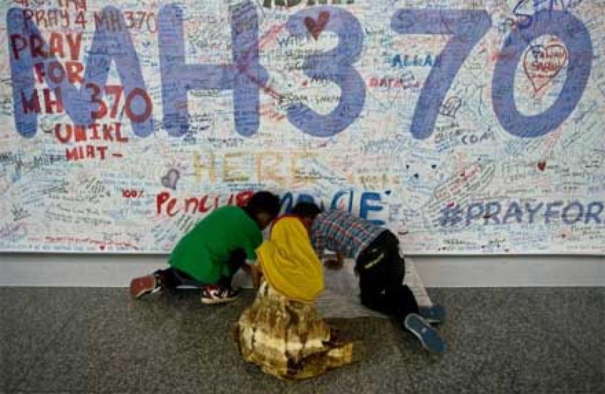 Australian widow of MH370 victim sue Malaysia Airlines