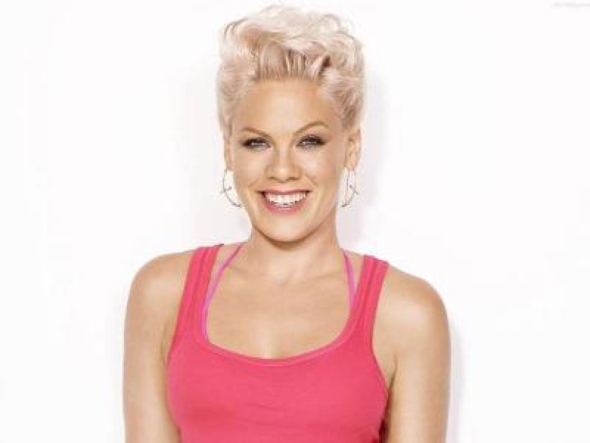 Pink flaunts post-baby weight with message to new moms