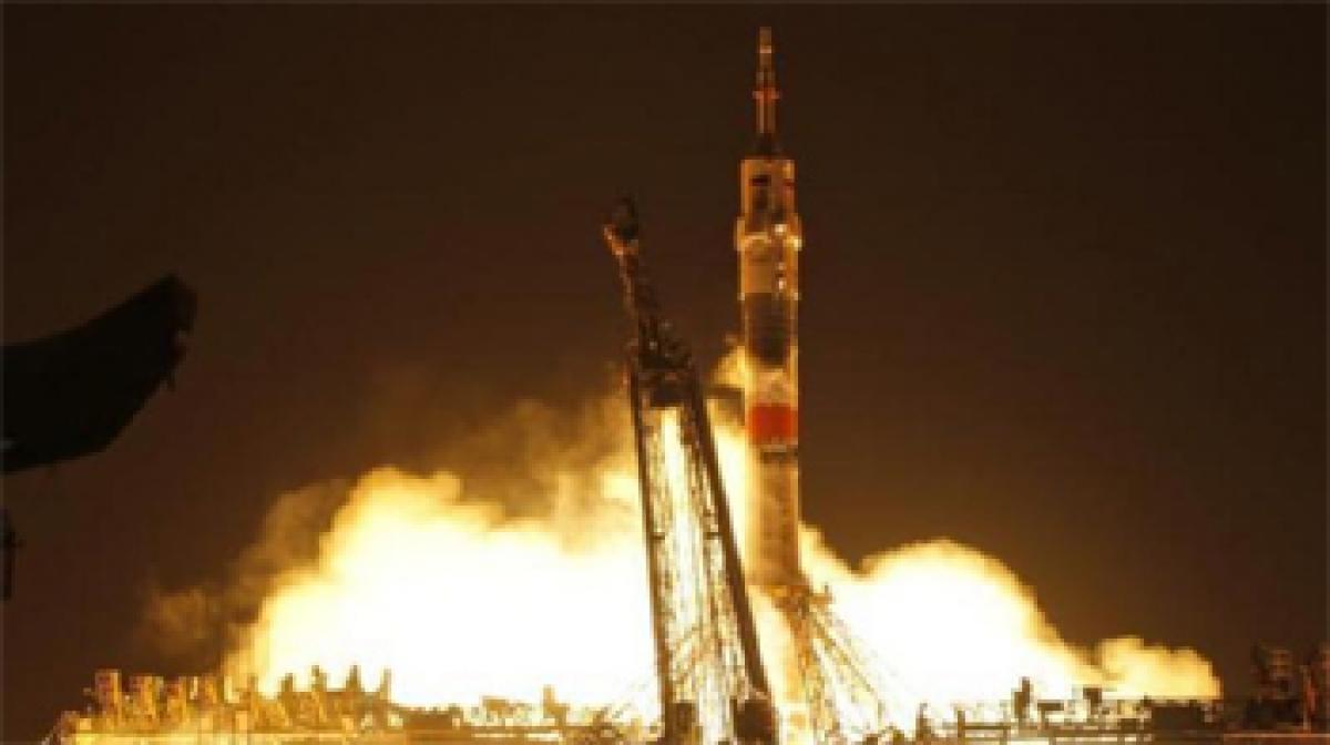 Destination space station: Russian rocket with US grandpa takes off