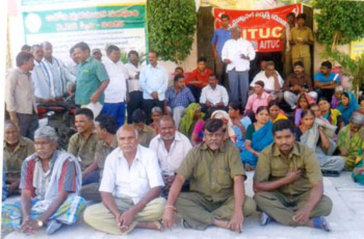 Municipal workers stage dharna