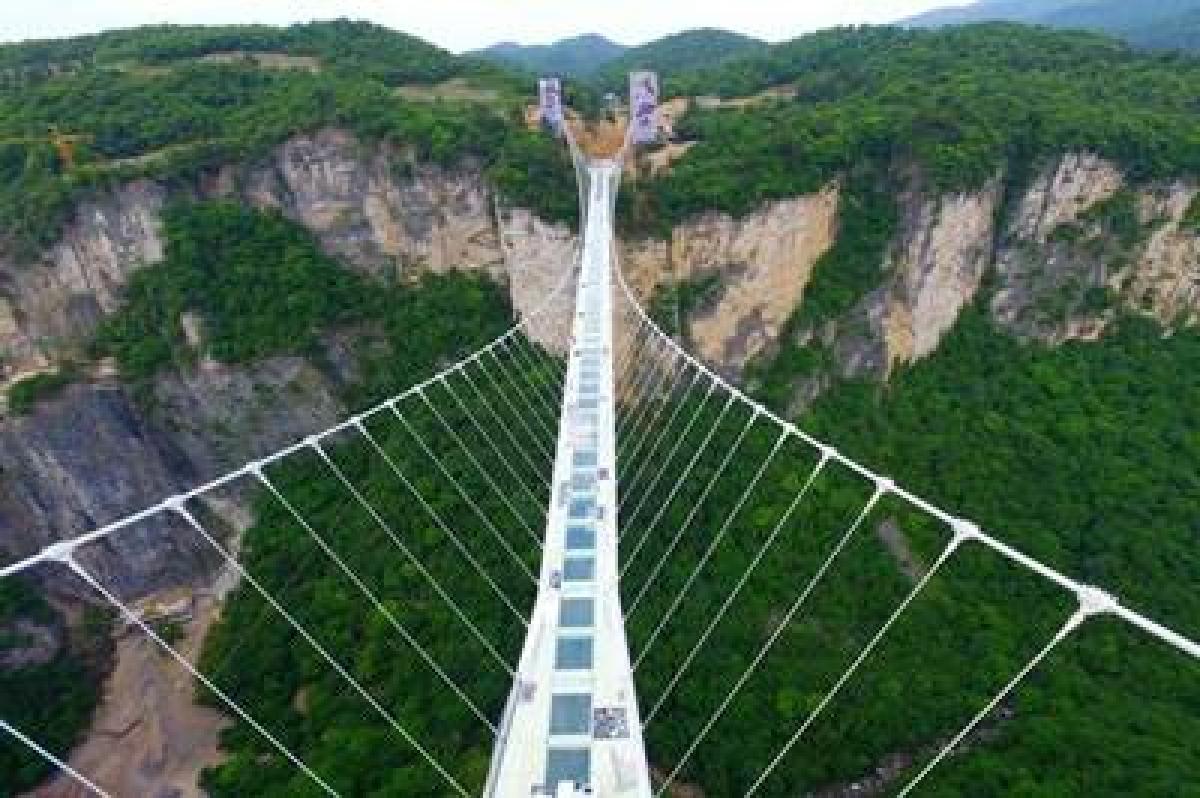 China tests safety of worlds longest glass bridge with truck