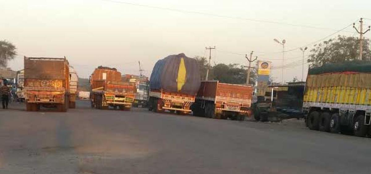 Parked trucks causing traffic snarls in Nirmal