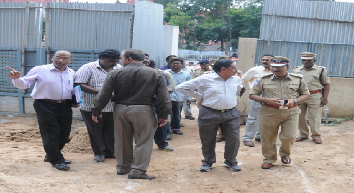 HMR chief, top cop inspect police barracks works