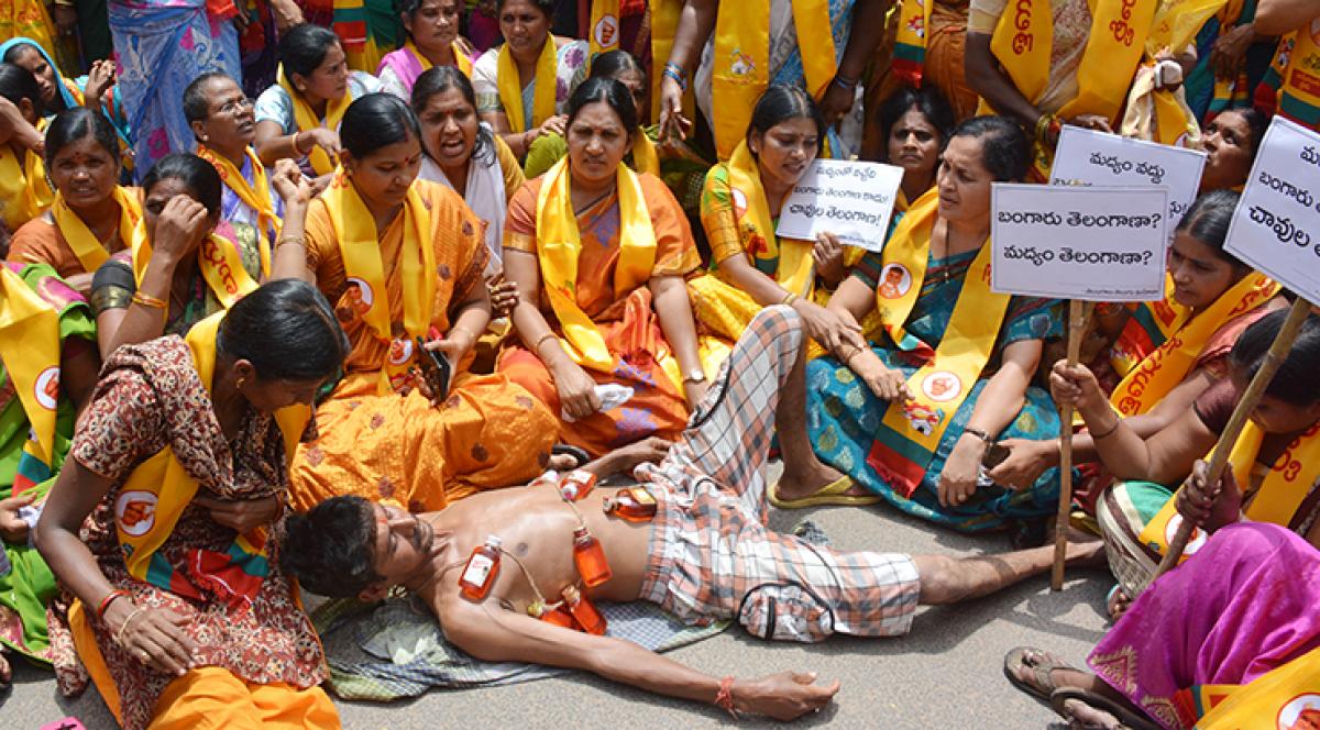 T TDP MLAs stage dharna against defectors