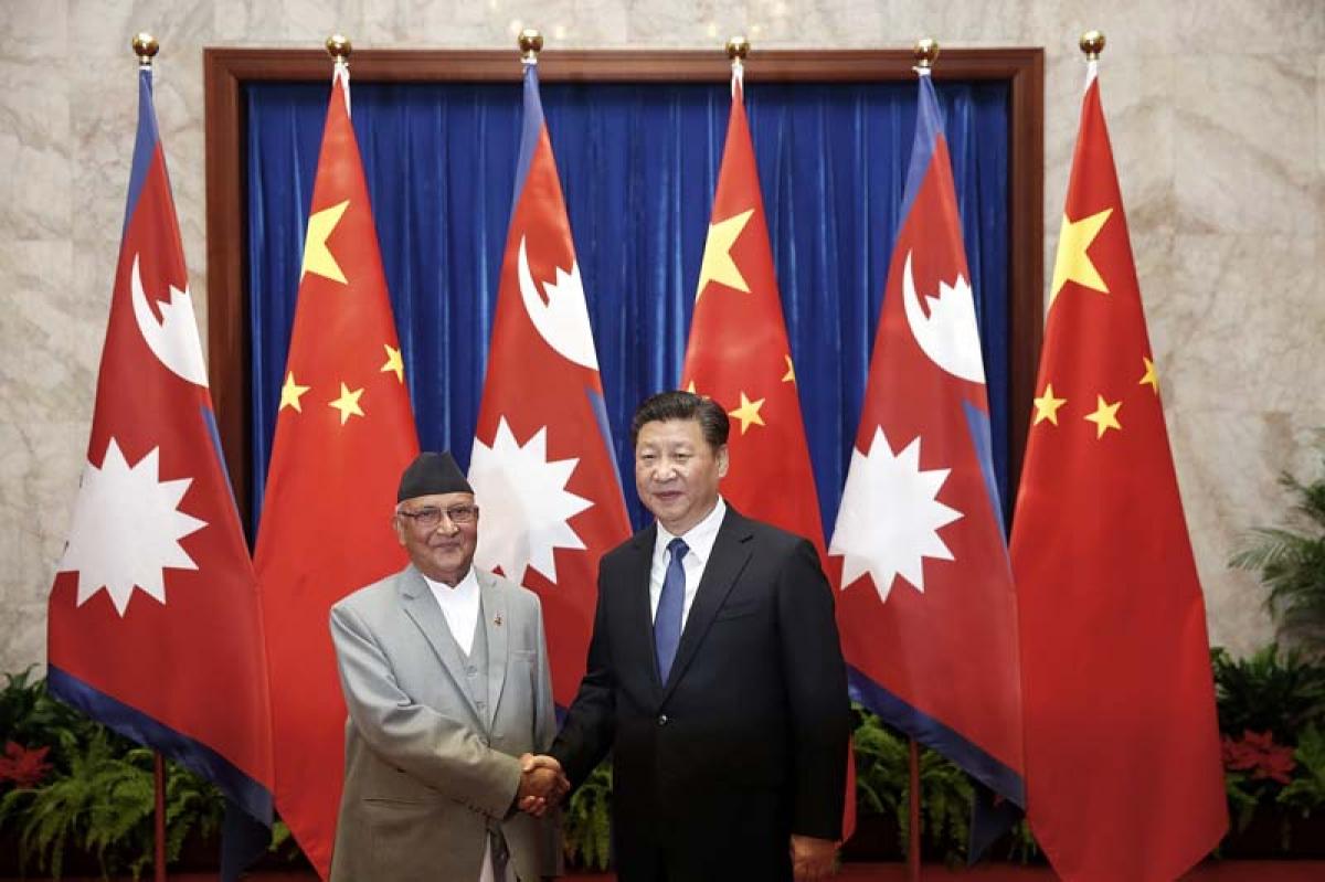 Chinese minister calls on Nepal PM Oli