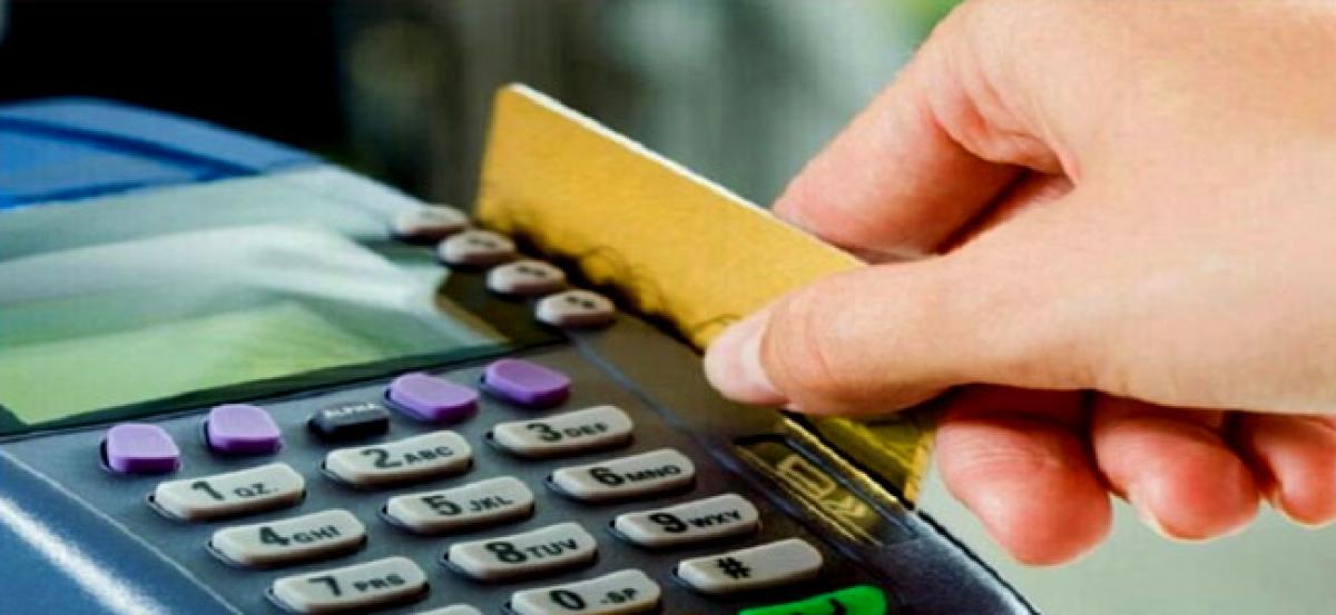 Govt to waive service tax on   card transactions up to Rs 2,000