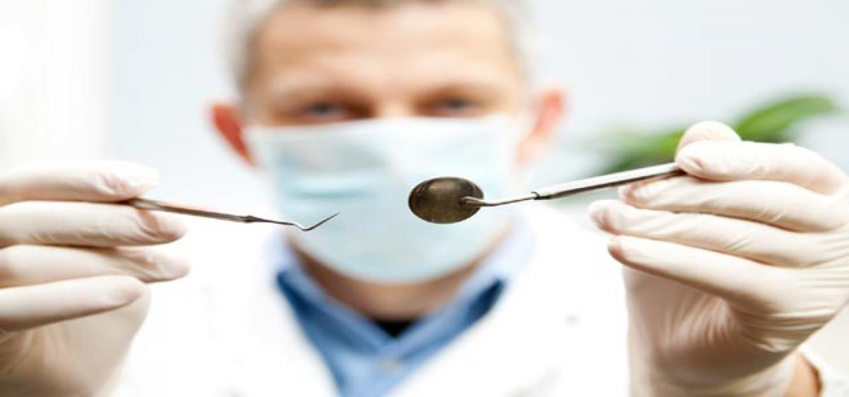 Visiting your dentist twice a year may cut pneumonia risk