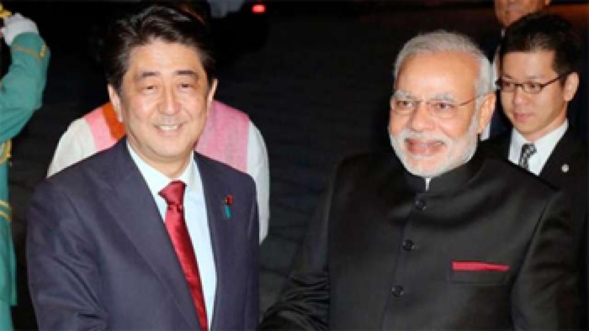 Shinzo Abe says Indian economy growing under Modi