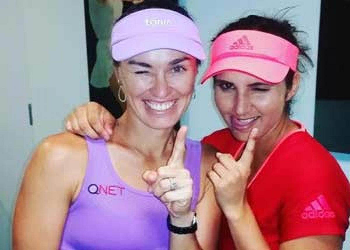 Sania-Hingis reach semis