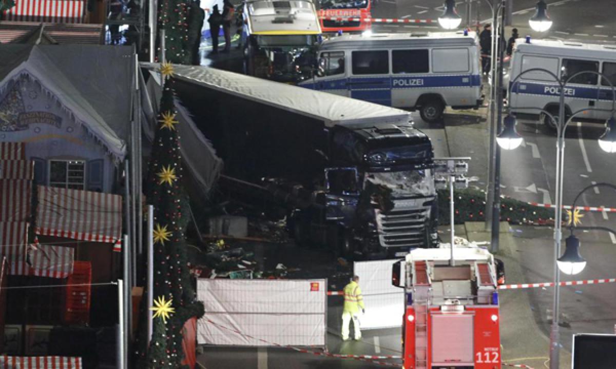 Truck ploughs into crowd at Berlin Christmas market killing at least 12 and 48 injured