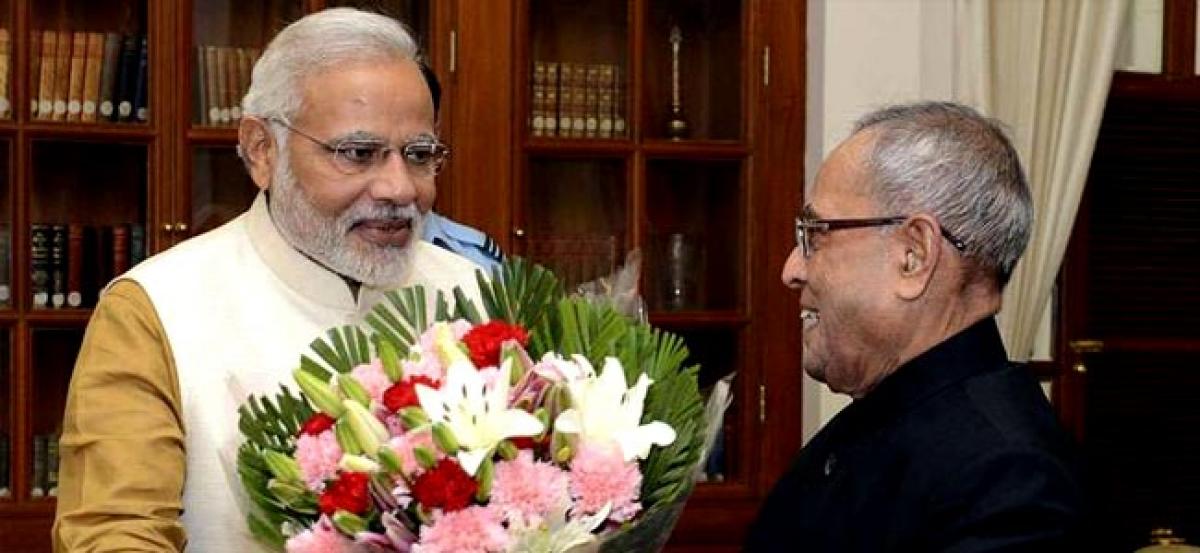 President Pranab Mukherjee and PM Narendra Modi greet nation on new year