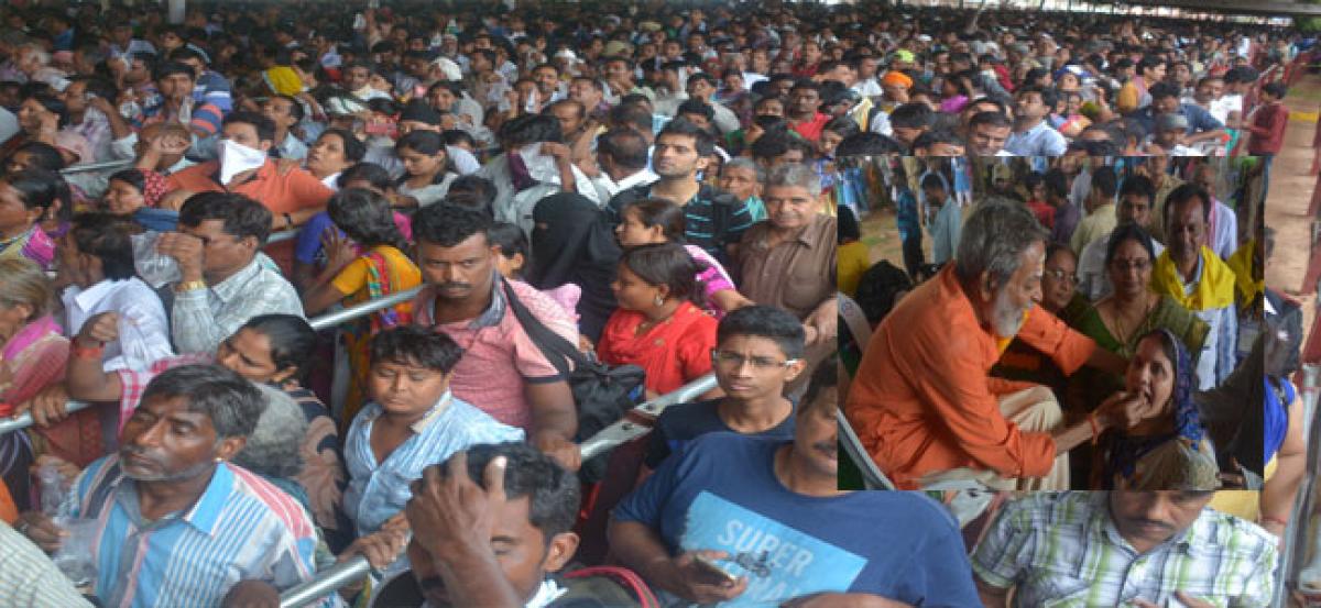 Thousands gulp down fish prasadam