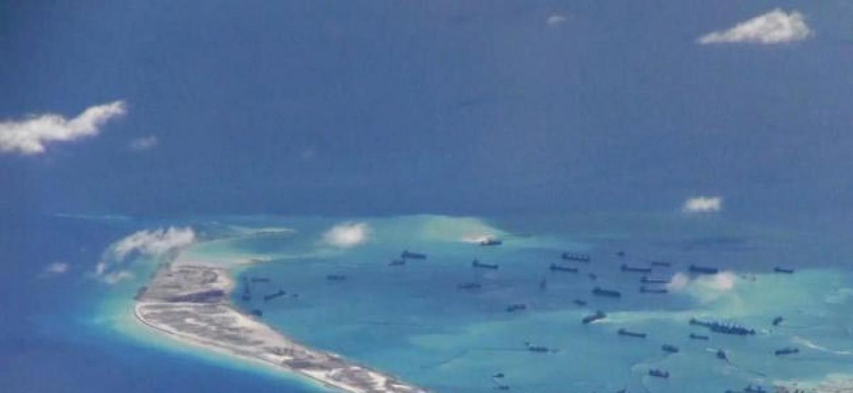 China finishing South China Sea buildings that could house missiles: US officials