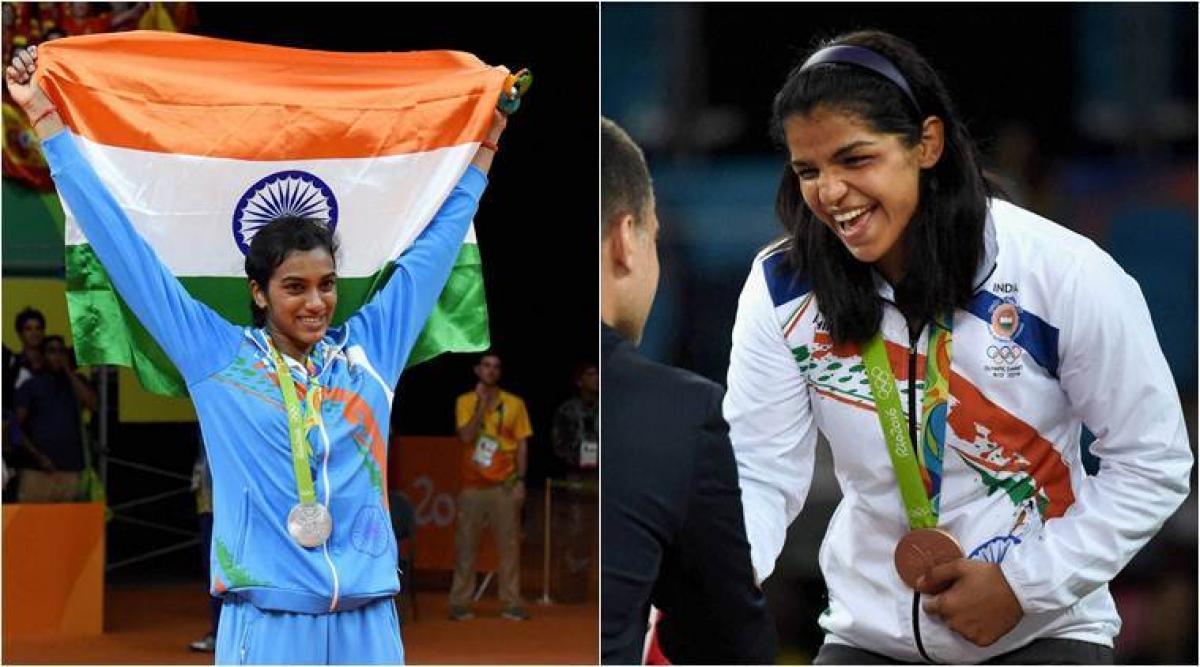 Olympic medalists PV Sindhu, Sakshi Malik felicitated by Delhi Govt