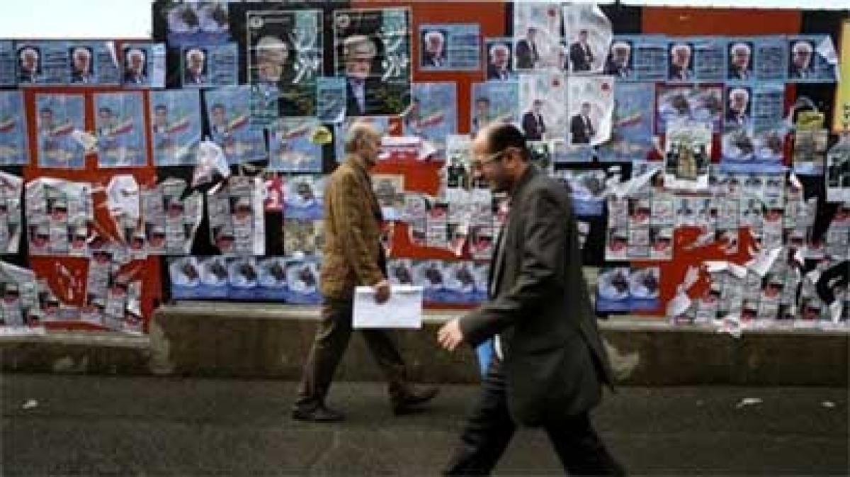 Iran votes in vital elections after nuclear deal