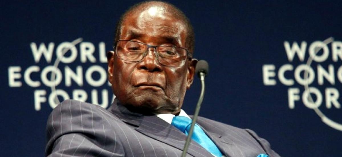 Slumped and mumbling, 93-year-old Robert Mugabe denies Zimbabwe is fragile