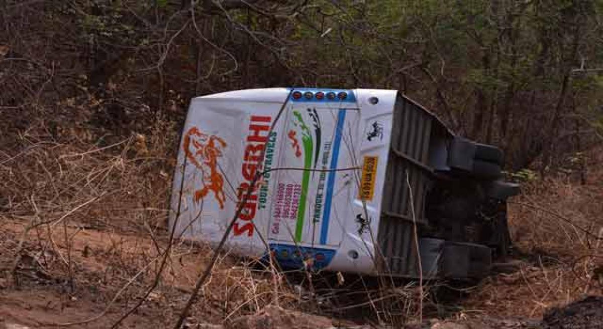 Adilabad woman dies as bus falls into gorge