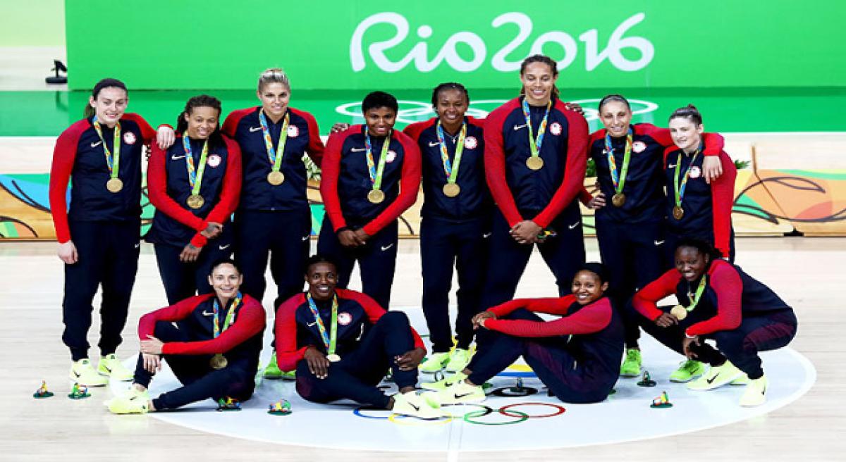 Basketball: US rolls past Spain to win sixth gold.
