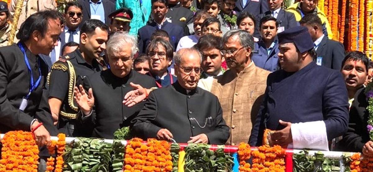 President Pranab Mukherjee offers prayers at Badrinath temple