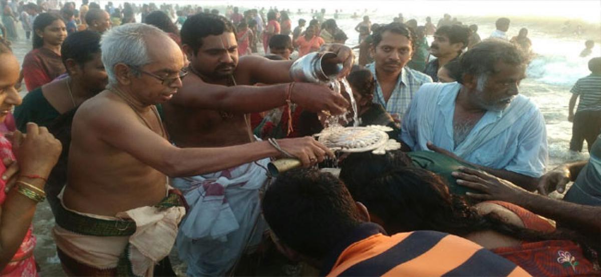 Thousands take holy dip in sea at Uppada