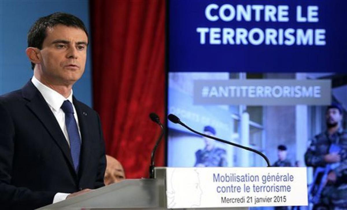 French PM warns of more attacks after man decapitated