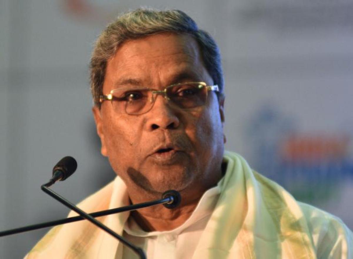 Karnataka CM Siddaramaiahs chopper makes emergency landing after bird hit