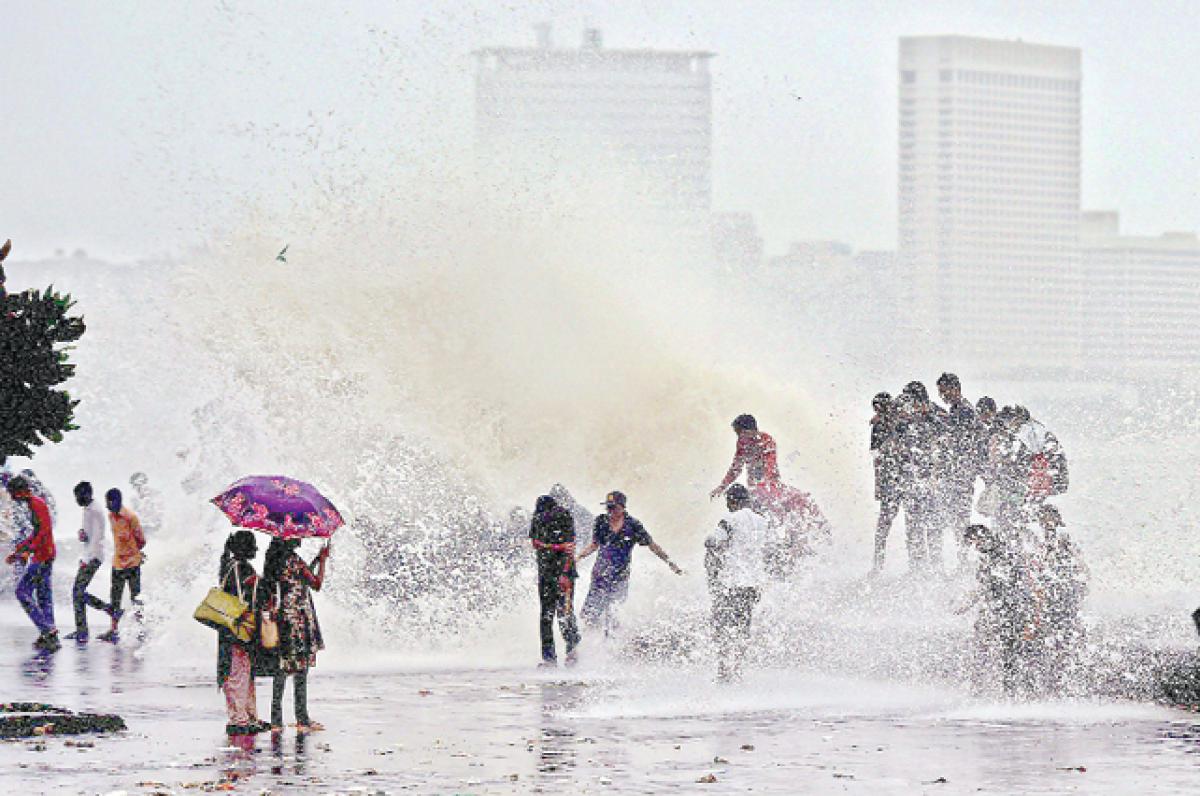 Mumbai limps back to normalcy